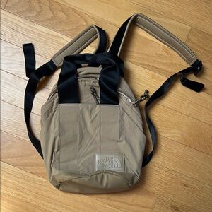 The North Face Tan and Black Backpack with Padded Straps